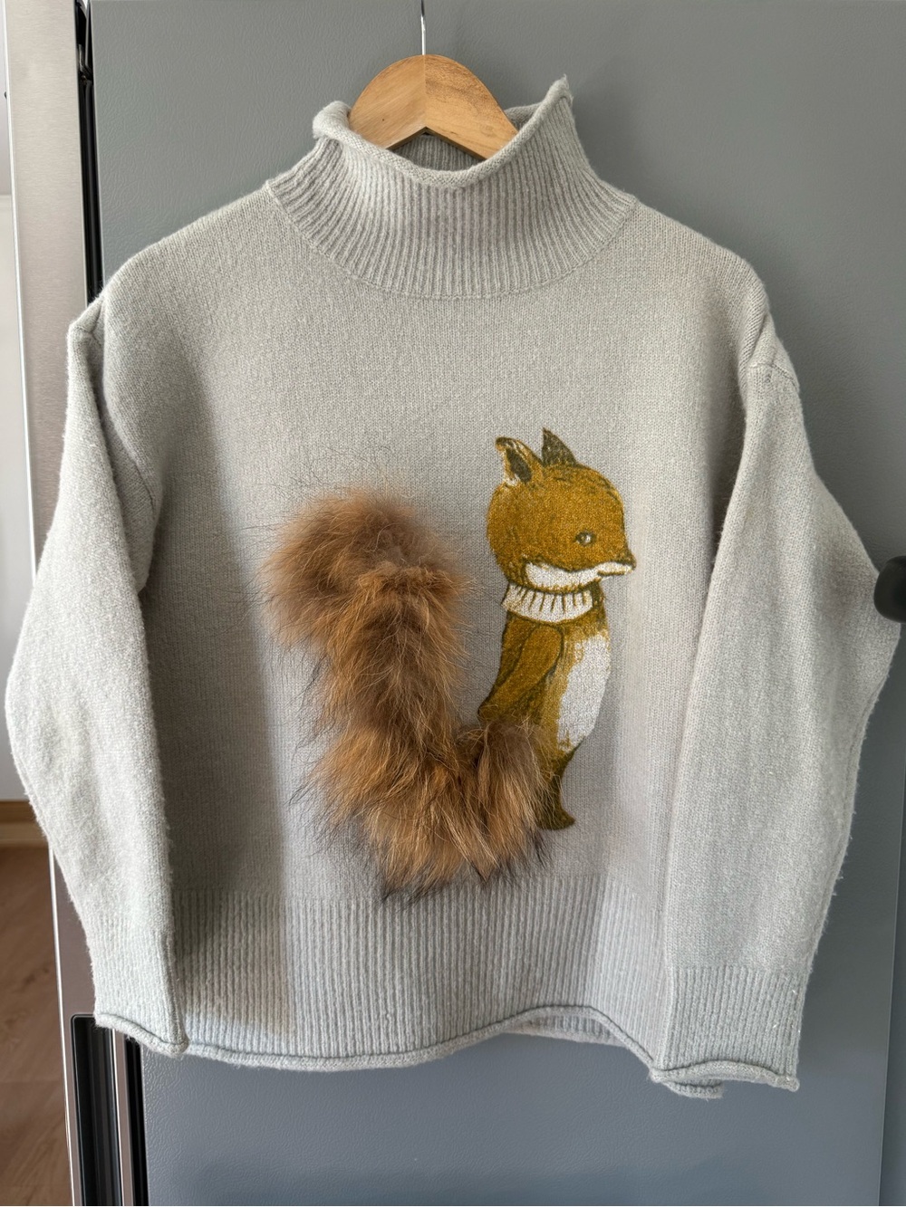 Fox Tail Light Grey Turtleneck Sweater